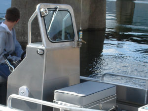 Center console with windshield and rotary steering